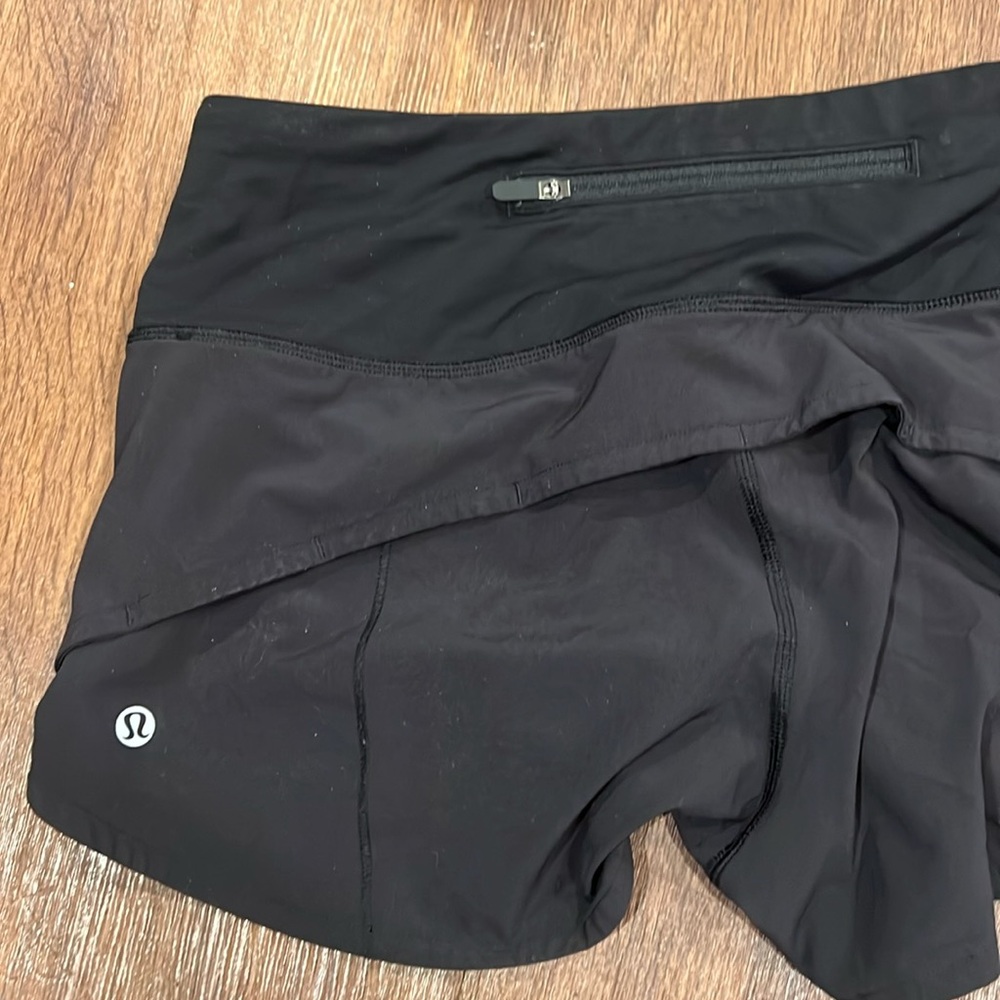 Lululemon size 8 black high waisted speed short. EUC / Like new condition.